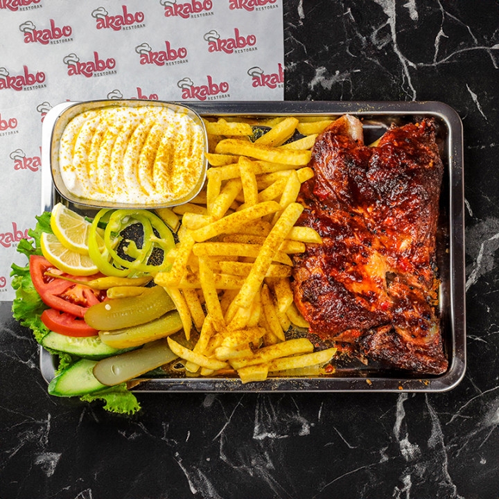 Half chicken on charcoal